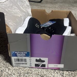 Skechers Women's Black and White Athletic Shoes